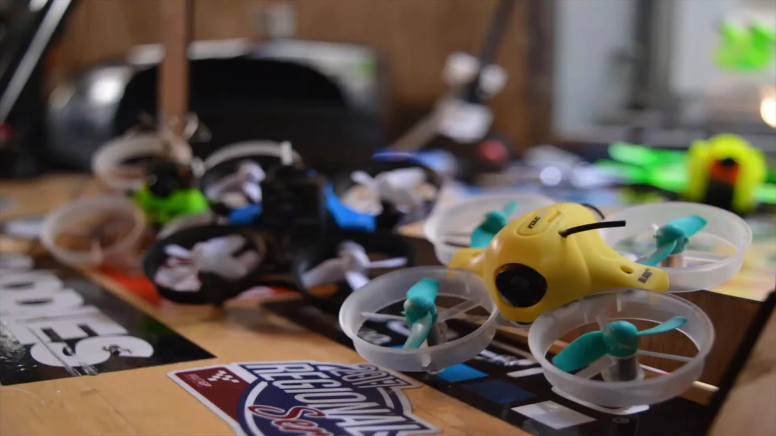 Small ducted FPV aircraft arranged on the workbench
