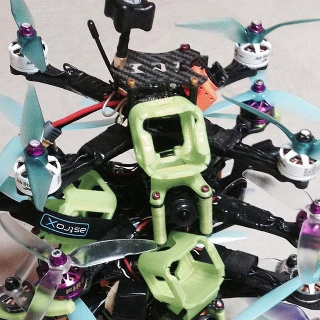 Early FPV quad build with camera mount and propellers